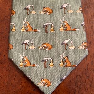 Hermès light green tie with fun fox and stalk motif